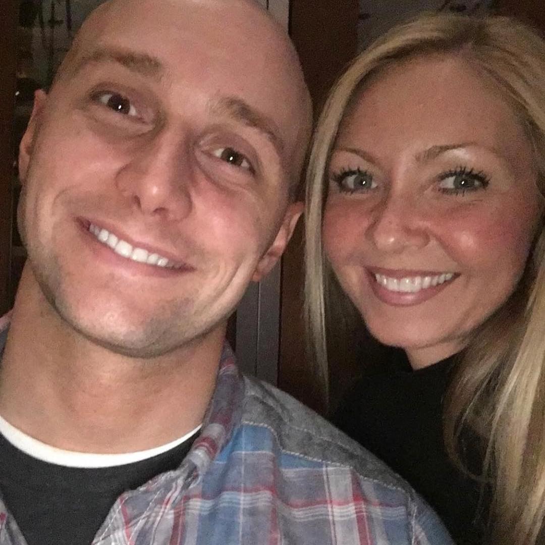 Craig Stratton and his wife smiling together